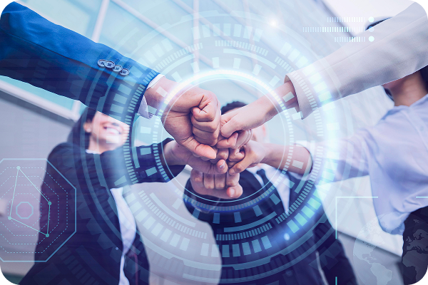 Team members fist-bumping, symbolizing partnership and collaboration